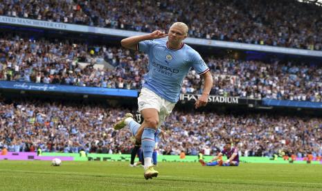  Pemain Manchester City Erling Haaland melakukan selebrasi dengan mencetak gol keempat timnya untuk melengkapi hattricknya dalam pertandingan Liga Inggris antara Crystal Palace dan Manchester City di Stadion Etihad di Manchester, Inggris, Sabtu 27 Agustus 2022. 