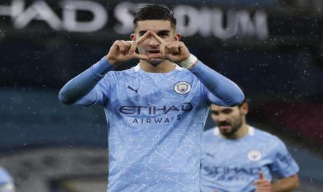 Pemain Manchester City, Ferran Torres, melakukan selebrasi usai menjebol gawang Newcastle United dalam laga Liga Primer Inggris pada Sabtu (26/12) malam waktu setempat.