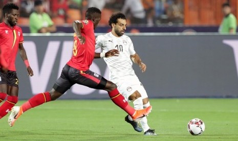 Pemain Mesir Mohamed Salah saat pertandingan melawan Uganda, Senin (1/7) dinihari WIB.