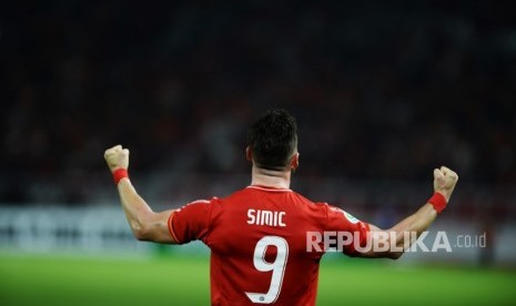 Pemain Persija Jakarta Marko Simic meluapkan kegembiraan usai mencetak gol ke gawang Tampines Rovers pada laga kedua Grup H Piala AFC di Stadion Utama Gelora Bung Karno, Jakarta, Rabu (28/2). 