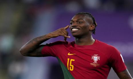 Pemain Portugal Rafael Leao merayakan gol ketiga timnya melawan Ghana selama pertandingan sepak bola grup H Piala Dunia di Stadion 974 di Doha, Qatar, Kamis, 24 November 2022. 