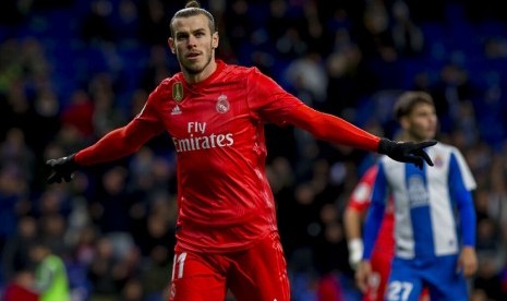 Pemain Real Madrid Gareth Bale merayakan gol usai menjebol gawang Espanyol dalam lanjutan La Liga di RCDE Stadium, Spanyol