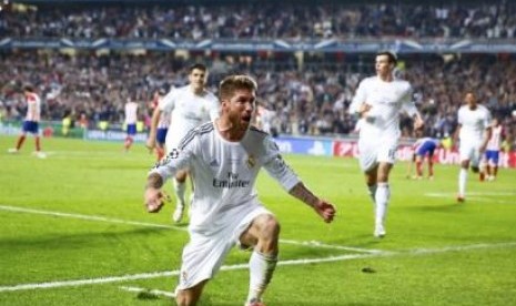 Pemain Real Madrid Sergio Ramos usai menyamakan kedudukan dengan Atletico Madrid.