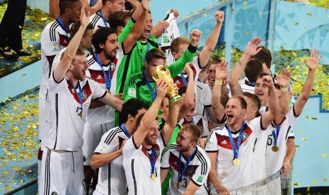 Pemain timnas Jerman melakukan selebrasi kemenangan setelah menjadi juara Piala Dunia 2014 usai mengalahkan Argentina 1-0