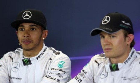 Pembalap Lewis Hamilton dan Nico Rosberg.