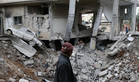 Pemboman wilayah di Suriah Ghouta yang dikuasai gerilyawan terus berlanjut .