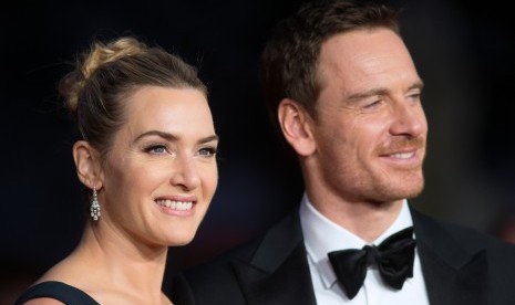 Pemeran utama film Steve Jobs, Kate Winslet dan Michael Fassbender saat menghadiri premiere film di London (18/10).