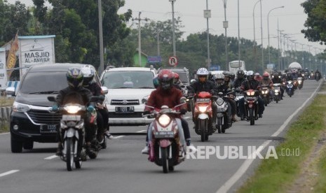  Pemudik yang menggunakan sepeda motor (ilustrasi).