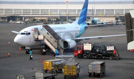 Penambahan Kursi Lebaran. Pesawat milik maskapai Garuda Indonesia parkir di Terminal 2 Bandara Internsional Soekarno-Hatta, Banten, Ahad (29/6).