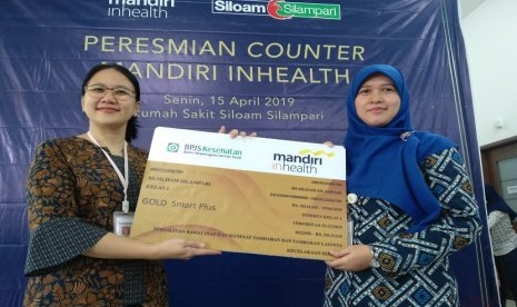 Penandatanganan perjanjian kerja sama dilakukan oleh Direktur RS Siloam Silampari dr. Susanti Abdiwidjaja, M.Biomed (kiri) dan Kepala Kantor Operasional Mandiri Inhealth Palembang Masayu Fadila Febriyanti