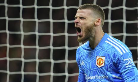  Penjaga gawang Manchester United David de Gea melakukan selebrasi.