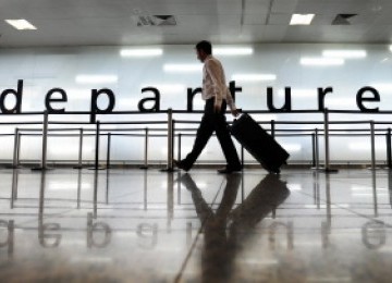 Penumpang di Bandara Glasgow, Skotlandia