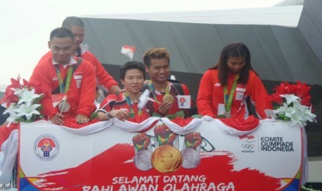 Penyambutan pebulu tangkis Tontowi Ahmad dan Liliyana Natsir.