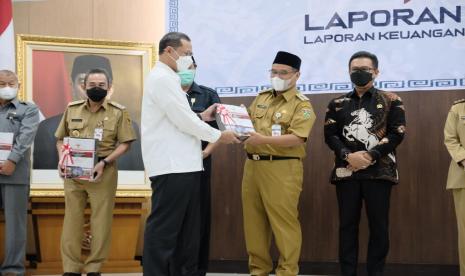 Penyerahan WTP atas kinerja laporan keuangan Pemkot Magelang.