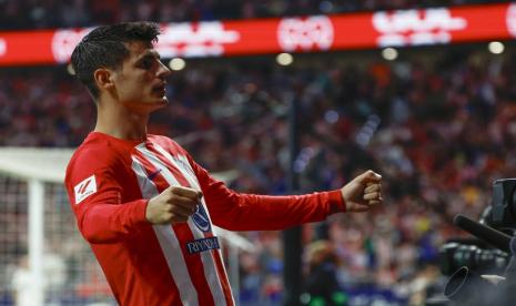 Penyerang Atletico Madrid Alvaro Morata merayakan gol setelah menjebol gawang Real Madrid.