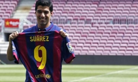 Penyerang Luis Suarez.