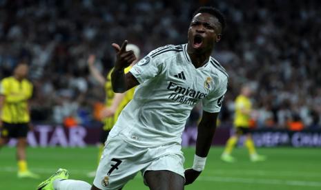 Penyerang Real Madrid Vinicius Junior berselebrasi setelah menjebol gawang Real Madrid dalam pertandingan Liga Champions di Santiago Bernabeu, Madrid, Rabu (23/10/2024) dini hari WIB.