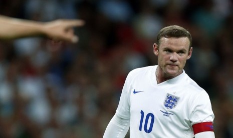 Penyerang Wayne Rooney.