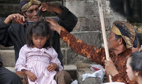 People in Dieng, Central Java, hold a tradition of 