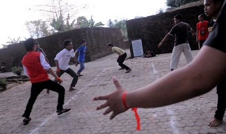 People play traditional game called 