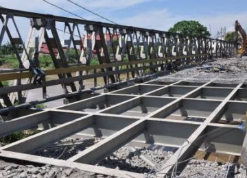 Perbaikan jembatan di daerah Kabupaten Brebes, Jawa Tengah.