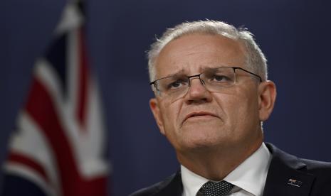 Perdana Menteri Australia Scott Morrison berbicara pada konferensi pers di Sydney, Kamis, 24 Februari 2022, ketika Rusia mulai menyerang Ukraina. Morrison mengatakan sanksi terhadap Rusia akan menjadi undang-undang pada hari Jumat tetapi tidak akan berlaku sampai akhir Maret.