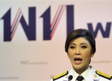 Perdana Menteri Thailand Yingluck Shinawatra menggelar konferensi pers usai disahkan sebagai perdana menteri oleh Raja Thailand, Senin (8/8).