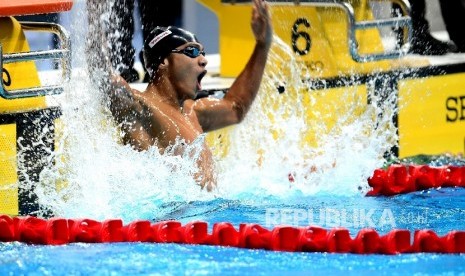 Perenang Indonesia Gagarin Nathaniel bertanding pada renang nomor 100 meter gaya dada SEA Games 2017 Kuala Lumpur di National Aquatic Center, Komplek Stadium Bukit Jalil, Malaysia, Jumat (25/8). 