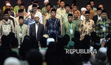 Peringatan Hari Lahir PBNU. Presiden Joko WIdodo (tengah) bersama pegurus pusat PBNU menghadiri Peringatan Harlah ke-93 PBNU di Balai Sidang Jakarta, Kamis (31/1/2019).