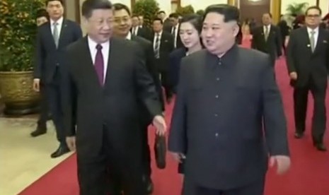 Pertemuan pemimpin Korea Utara Kim Jong-un dengan Presiden Cina Xi Jinping.