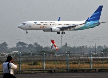 Pesawat Garuda saat mendarat di Bandara Soekarno-Hatta, Cengkareng, Banten.