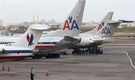 Pesawat maskapai American Airlines. Penumpang gelap asal Guatemala bersembunyi di bilik roda pendarat pesawat yang terbang ke Miami. Ilustrasi.