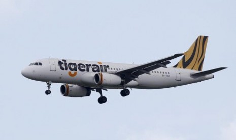 Pesawat Tiger Airways Airbus A320 mendekati Bandara Changi Singapura, 5 Januari 2016.