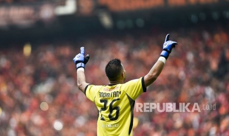 Pesepak bola Persija Jakarta Andritany Ardhiyasa merayakan gol dalam pertandingan liga 1 2018, di Stadion Gelora Bung Karno, Jakarta, Ahad (9/12/2018).