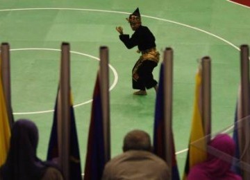 Pesilat Indonesia, Eko Wahyudi, saat tampil pada final nomor seni beladiri tunggal purta pencak silat Sea Games XXVI di Padepokan Pencak Silat, TMII, Jakarta Timur, Selasa (15/11).