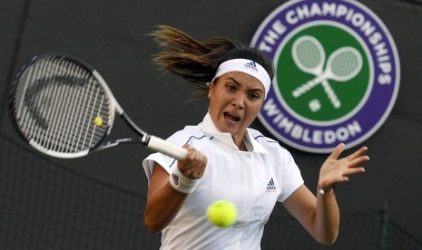 Petenis wanita berlaga di ajang pertandingan Wimbledon di London, Inggris. Wimbledon 2020 secara resmi dibatalkan akibat pandemi Covid-19.