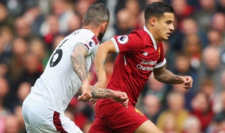 Philippe Coutinho beraksi ketika Liverpool menghadapi Burnley pada lanjutan Liga Primer, Sabtu (16/9). Laga itu berakhir imbang 1-1.