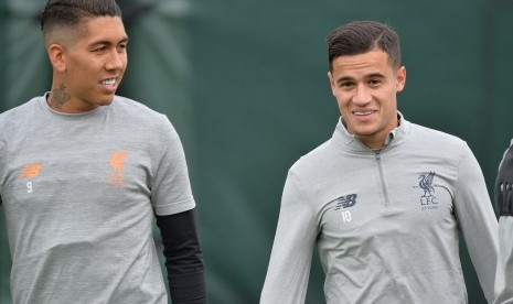 Philippe Coutinho dan Roberto Firmino.