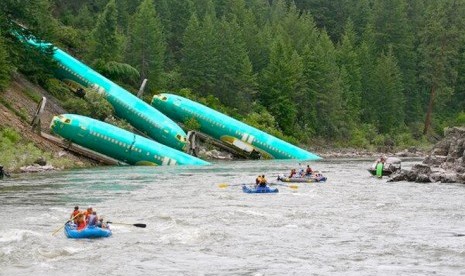 Photo taken by nearby rafter Kyle Massick shows Boeing parts in the Clark Fork River after a train derailed in Montana. 