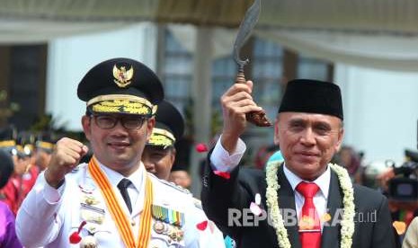 Gubernur Jawa Barat Ridwan Kamil (kiri) bersama M Iriawan. KNPI Jabar mendorong Ridwan Kamil maju jadi capres dan Iwan Bule jadi cagub Jabar.