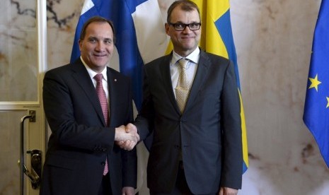 PM Swedia, Stevan Lofven (kiri)