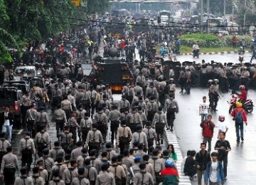 Police clashes with protesters in a rally against government's plan to rise the fuel price.  