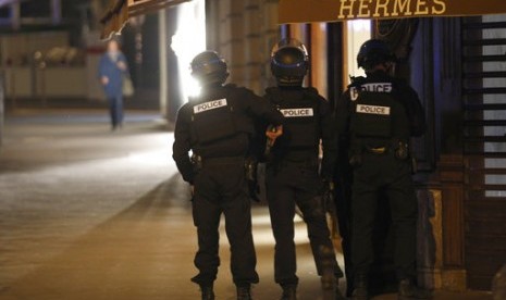 French police standing by near Champs Elysees, Paris.