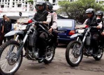 Polisi saat naik motor/ilustrasi