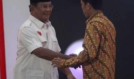 Presidential candidates Prabowo Subianto (left) and Joko Widodo during presidential debate on Sunday night. (File photo)