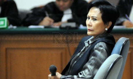  Presdir PT Indoguna Utama, Maria Elizabeth Liman menjalani sidang perdana kasus suap impor daging sapi di Pengadilan Tipikor, Jakarta, Selasa (11/3). (Republika/Aditya Pradana Putra)