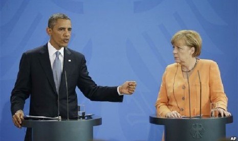 Presiden AS Barack Obama (kiri) dan Kaselir Jerman Angela Merkel dalam konferensi pers bersama di Berlin, Jerman, Rabu (