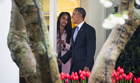 Presiden AS Barrack Obama dan putrinya Malia