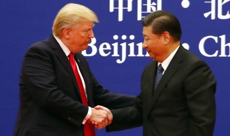 Presiden AS Donald Trump dan Presiden Cina Xi Jinping di Great Hall of the People di Beijing, Cina, Kamis (9/11).