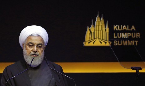 Rouhani: Iran tidak akan Kembangkan Senjata Nuklir. Presiden Iran Hassan Rouhani menyampaikan pidato di Konferensi Tingkat Tinggi (KTT) Kuala Lumpur di Kuala Lumpur, Malaysia.